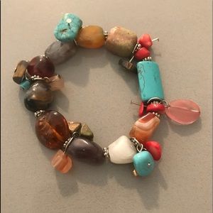 Stone bracelet with dangling charms/stones